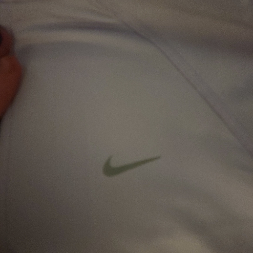 Womens Nike Dri fit 3/4 zip pullover. Lavender and dark purple.  Size small